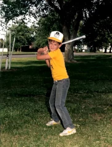 Allan Draper as a kid at bat in his farm town